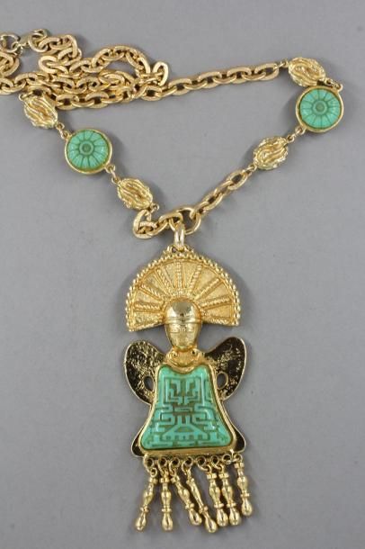 null ANONYME

Collier en métal doré et résine turquoise orné d'une personnage in...