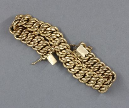 null Bracelet en or jaune 18k à maille américaine, pds : 33,9 g.