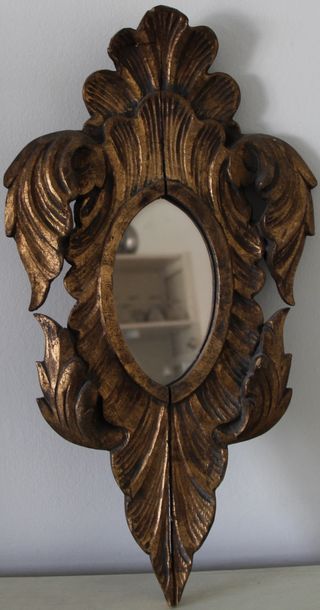 null *Petit miroir en bois doré H : 46 cm