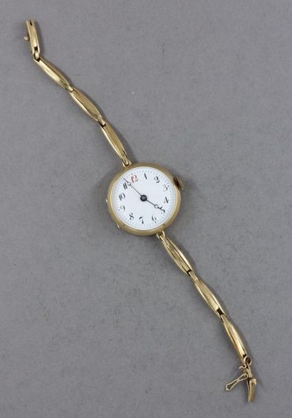 null Bracelet-montre à boitier rond en or jaune 18k et bracelet en métal doré, pds...