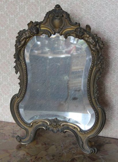 null Miroir en bronze de style Louis XV


H : 55 cm