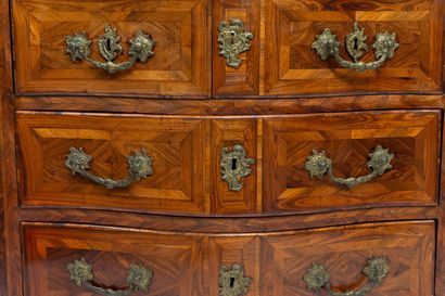null Chest of drawers with a curved front in violet or rosewood marquetry decorated...