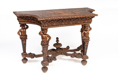 null Carved walnut console with rich decoration of flowers and scrolls.

The four...