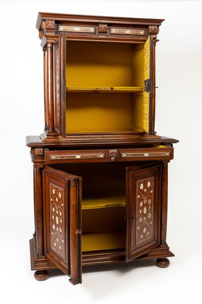 null Two parts cabinet in natural wood, marquetry and ivory applications.

It opens...