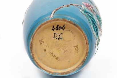 null LONGWY, Eugene COLLINOT (1824-1889).

Turquoise baluster vase in earthenware...