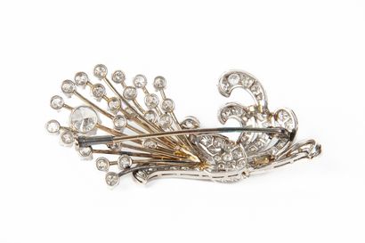 null White gold brooch decorated with a ribboned ear of corn, one of the strands...
