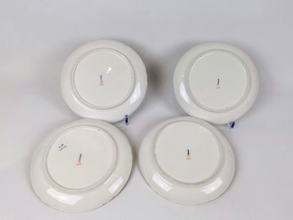 null BERLIN, KPM. 

Set of fourteen porcelain dessert plates with polychrome enamelled...