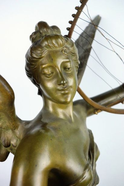 null Eugène MARIOTON (1857-1933).

L'Inspiration.

Sculpture en bronze à patine verte...