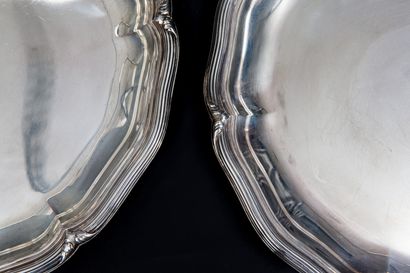 null PUIFORCAT. 

Pair of circular silver dishes, model with moving nets and acanthus...