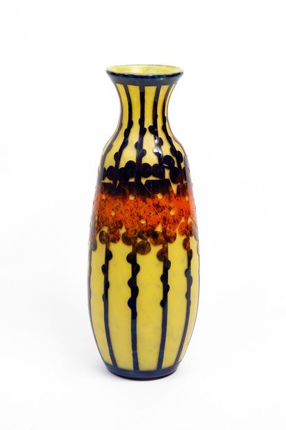 null FRENCH GLASS.

A large multi-layered acid-etched glass vase decorated with polychrome...
