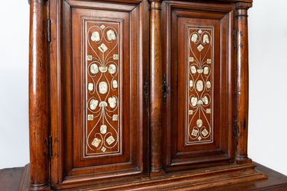 null Two parts cabinet in natural wood, marquetry and ivory applications.

It opens...