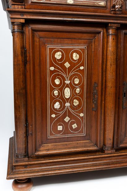 null Two parts cabinet in natural wood, marquetry and ivory applications.

It opens...