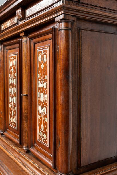 null Two parts cabinet in natural wood, marquetry and ivory applications.

It opens...