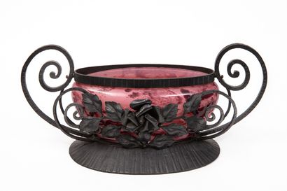 null DELATTE in Nancy.

Oblong planter out of marbled glass, the wrought iron mounting...