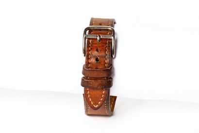 null HERMÈS Paris.

Ladies' wristwatch "Harnais" model in steel and original brown...