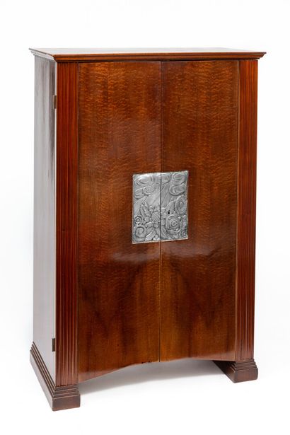 null A satinwood veneer bar cabinet, opening on the top shelf and through two leaves...