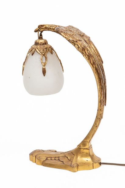 null Charles RANC (XIXème-XXème).

Lampe de bureau à pied en bronze ciselé et doré...