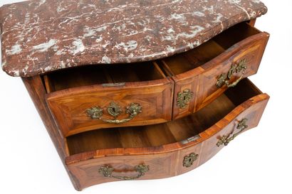null Chest of drawers with a curved front in violet or rosewood marquetry decorated...