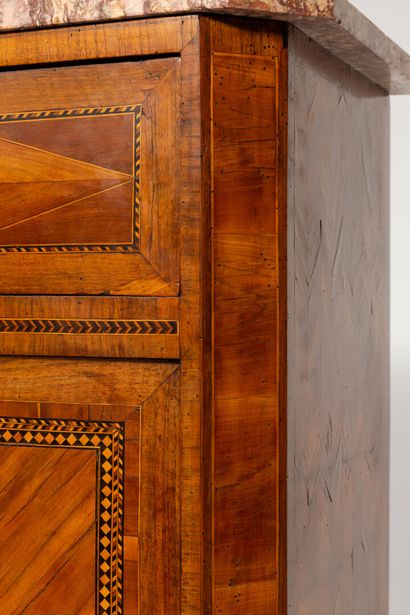 null Secretary with flap in light wood, stained wood and rosewood marquetry.

It...