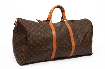 null LOUIS VUITTON.

Keepall" travel bag in coated monogram canvas and natural leather...