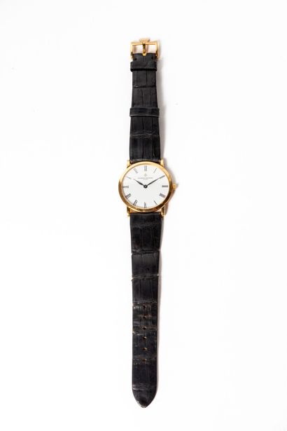 null VACHERON CONSTANTIN.

Extra-flat round wristwatch with yellow gold case numbered...