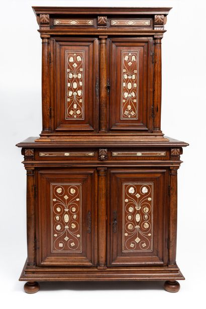 null Two parts cabinet in natural wood, marquetry and ivory applications.

It opens...