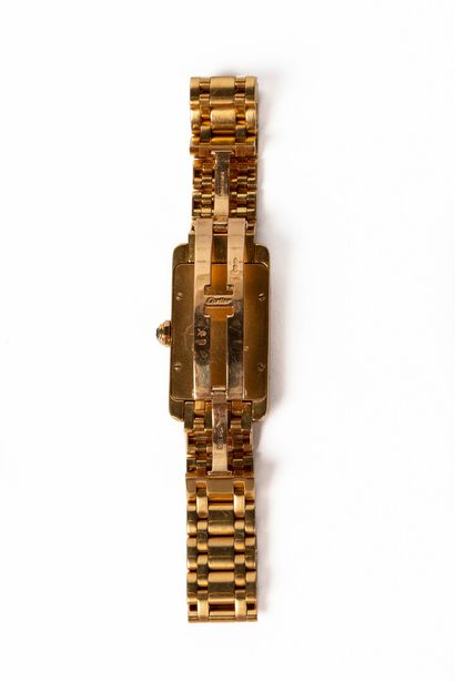 null CARTIER.

Rectangular ladies' wristwatch, "American Tank" model, original yellow...