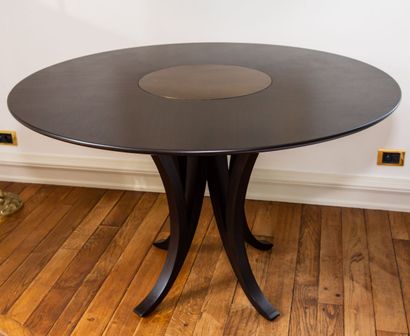 null CG DESIGN.

Table guéridon en bois exotique type palissandre, l'empiècement...