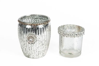 null Two decorative glass candle holders, one with silver pearl inclusions.

Contemporary...