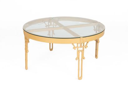null Circular coffee table in wrought iron lacquered in bronze color, with a glass...