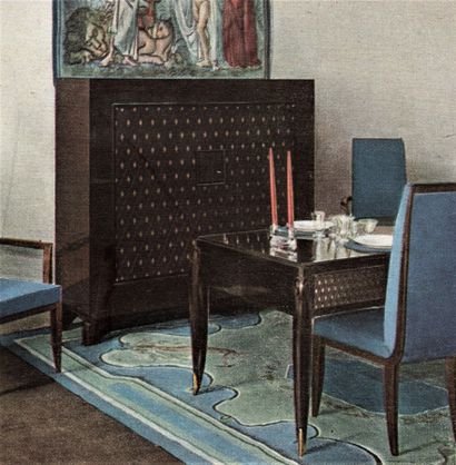  Jean PASCAUD (1903-1996). 
Rare bureau plat à deux caissons suspendus en bois noirci...