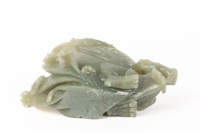 null CHINA late Qing dynasty (1644-1912).

Oblong libation cup in pale green jade...