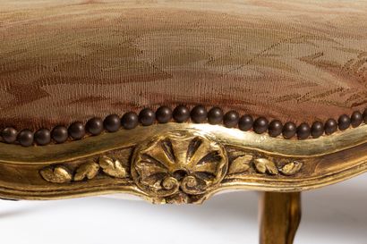 null Carved and gilded wood living room furniture including a sofa, a suite of four...