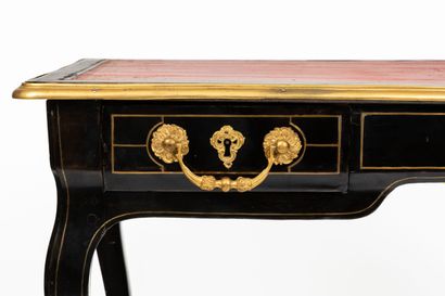 null Small flat desk in blackened wood and ornamentation of gilded bronzes and nets...