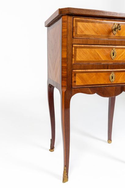 null Bedside table in marquetry of rosewood and violet wood decorated with frames.

The...