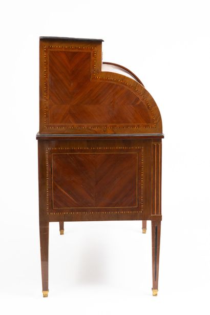 null Cylinder desk in rosewood marquetry, framed with two-tone braids, tinted pearwood...