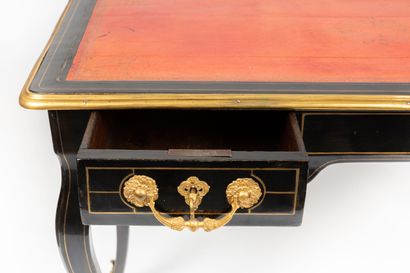 null Small flat desk in blackened wood and ornamentation of gilded bronzes and nets...