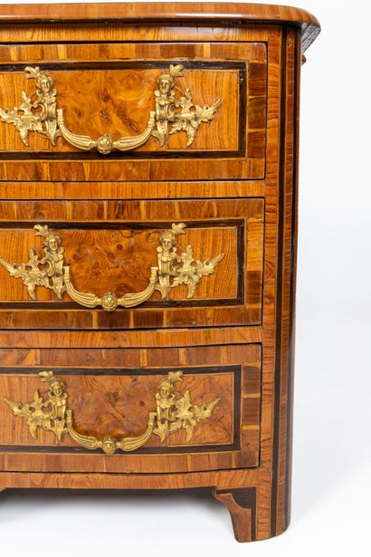 null Large chest of drawers with curved front and rounded uprights in marquetry of...