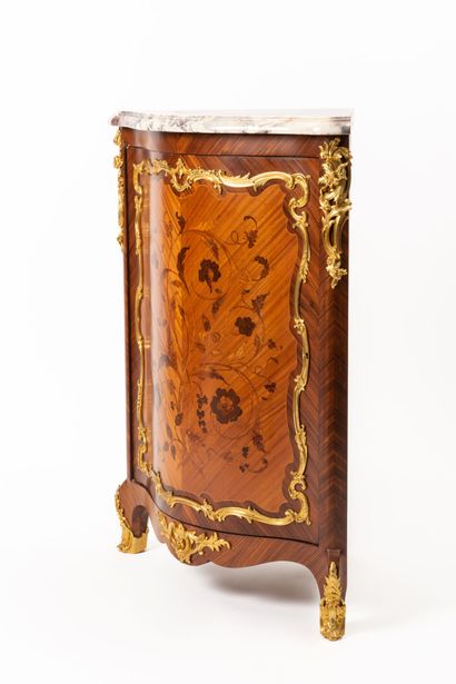null A marquetery inlaid with wood, opening to a door decorated with floral scrolls.

Rich...