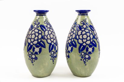 null BOCH KERAMIS, Charles CATTEAU.

Pair of earthenware vases, with Art Deco floral...