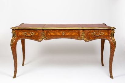 null Large flat desk in rosewood marquetry and rich ornamentation of gilded bronzes...