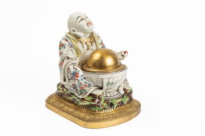 null SAMSON.

Polychrome porcelain group in the taste of Chantilly featuring a seated...