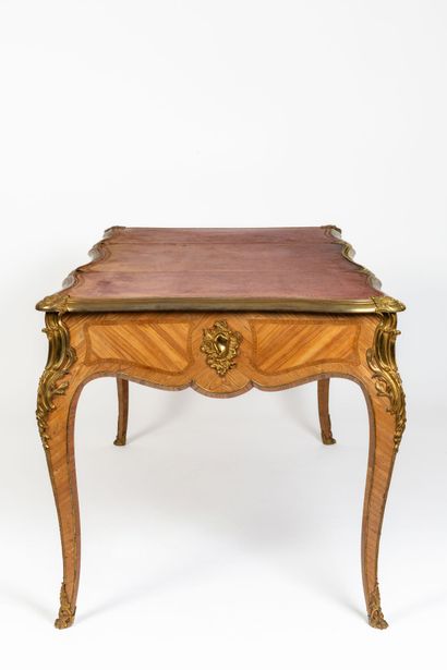 null Large flat desk in rosewood marquetry and rich ornamentation of gilded bronzes...