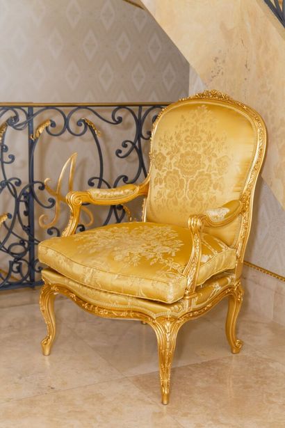null 
Armchair with flat back violoné out of carved and gilded wood and trimming...