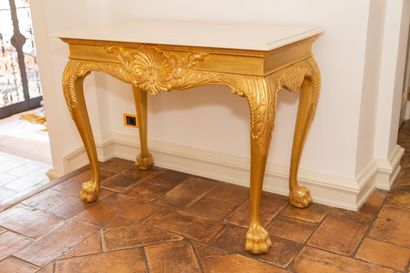 null ARMANDO RHO, Italy, attributed to.

Carved and gilded wood console decorated...