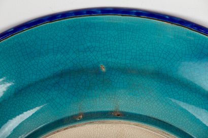 null LONGWY, In the taste of 

Large earthenware dish with polychrome enamel in relief...