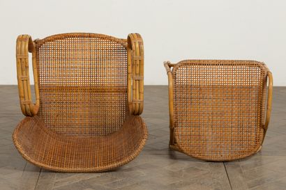 null Armchair with curved back and its footrest in rattan. 

Around 1950.

H_90 cm...