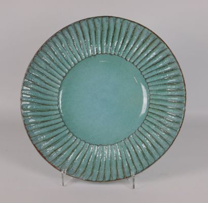null Contemporary school.

Suite of three turquoise blue glazed ceramic pieces including...