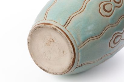 null BOCH KERAMIS.
Baluster vase with hemmed neck in stoneware with cracked turquoise...
