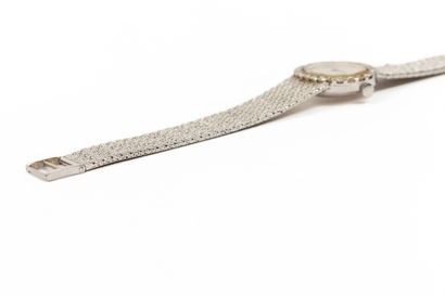null MORABITO, Paris.
Ladies' wristwatch with white gold case and bracelet, the oval...